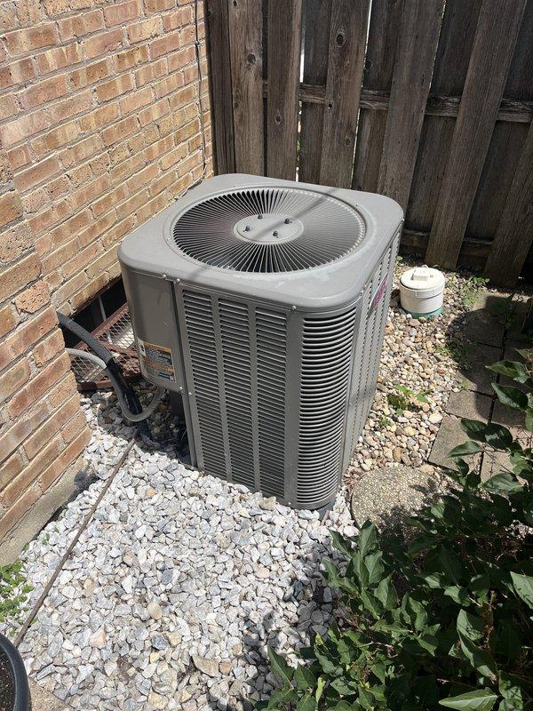 Completed HVAC system evaluation for equipment replacement estimate on residential property with 2015 air conditioning unit and 2012 furnace system. Previous service history indicated outdoor condenser unit exhibited intermittent buzzing noise with refrigerant pressure fluctuations suggesting possible restriction or non-condensables in the AC system, along with low side pressure readings and corresponding suction line temperatures running below normal parameters. Furnace demonstrated blower motor start-up hesitation and relay clicking indicating failing control board requiring imminent replacement or full system upgrade.

Performed comprehensive assessment of existing HVAC equipment including outdoor condenser unit positioned on gravel pad in side yard and indoor furnace/air handler with attached humidifier located in basement utility area. Evaluated current system performance issues including reported AC malfunction and water leak from rear of unit. Confirmed aging equipment beyond ty
