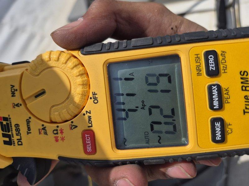Completed annual Comfort Plan clean and check maintenance on one air conditioning system located in basement utility area. Performed comprehensive inspection of HVAC unit, verified electrical amperage readings showing 37.5A using clamp meter, confirmed proper system operation, and documented equipment condition with photos per service contract agreement.