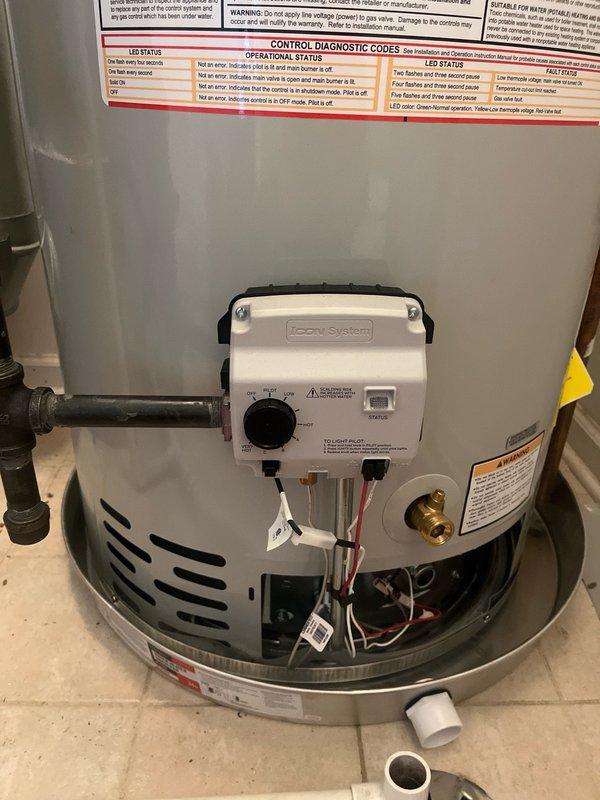 Successfully installed a new 50-gallon residential tanked water heater in the utility closet. The unit was positioned on the existing drain pan with proper plumbing connections completed, including hot and cold water lines, TPR valve discharge piping, and gas supply line. All manufacturer safety labels and operational instructions remain visible and intact per code requirements.