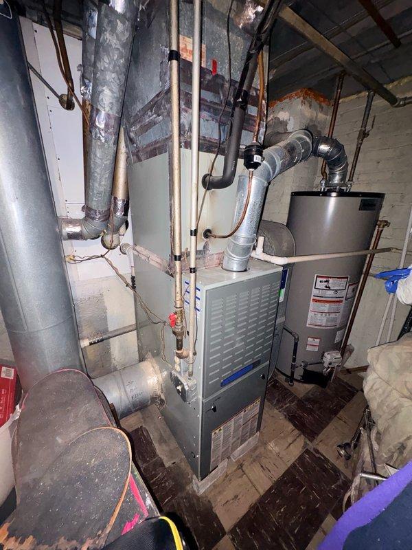 Completed annual air conditioning clean and check maintenance per service comfort plan on single HVAC system. Inspected furnace and associated ductwork, replaced dirty air filter, and verified proper operation of all mechanical components including water heater connections and refrigerant lines. All equipment found operating within normal parameters with no immediate service needs identified.