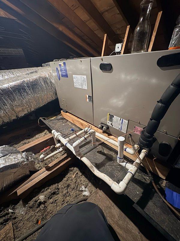 Responded to no-cooling call where air handler was operating but outdoor condensing unit failed to run. Upon arrival, performed system diagnostics on split HVAC system located in attic space. Inspected attic-mounted air handler and found heavily soiled air filter restricting airflow, which was replaced. Traced electrical supply to outdoor unit and identified failed contactor preventing compressor operation. Replaced defective contactor and verified proper voltage at compressor terminals. Tested system operation through complete cooling cycle, confirming outdoor unit engagement, proper refrigerant pressures, and adequate airflow at supply registers. Documented equipment information and photographed air handler installation and filter condition for service records. System restored to full cooling operation.