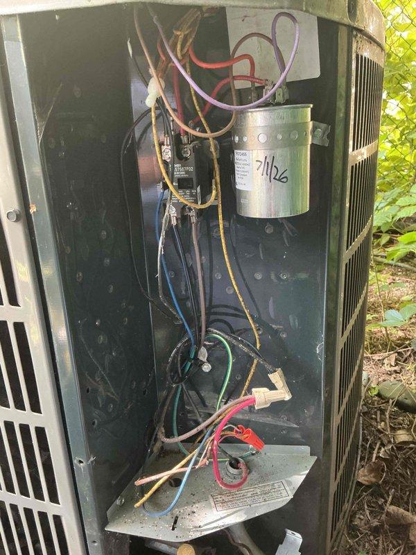 Completed follow-up maintenance call on 9-year-old residential air conditioning system following previous service visit. Performed system inspection and documentation of indoor air handler unit and outdoor condensing unit, verifying capacitor operation and electrical connections. All components photographed and system operational upon completion.