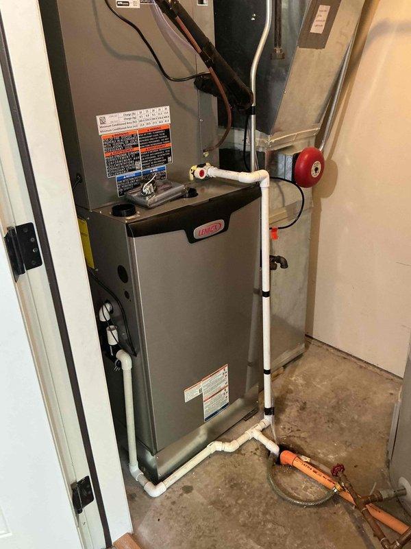 Completed full HVAC system replacement including disconnection and disposal of existing forced air furnace and air conditioning system. Installed new Lennox 97% AFUE 110,000 BTU two-stage variable speed forced air furnace (Model EL297UH110XV48CK) with connections to existing supply and return ductwork, gas line, electrical circuit, and exhaust system. Reclaimed refrigerant from old A/C system and installed new Lennox 3.5 ton single-stage air conditioning condensing unit (Model EL16KC1-036-230) on new pad at existing rooftop location. Installed new evaporator coil and connected to existing copper refrigerant lines. Evacuated system to remove moisture and air, then charged with R454B refrigerant to manufacturer specifications. Performed complete system startup, testing, adjustment, and safety inspection on all equipment to verify proper operation. All components functioning within normal parameters upon completion.