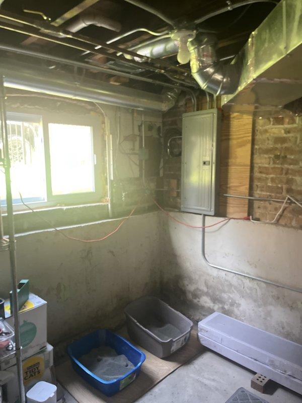 Responded to service call for residential air conditioning system with reported compressor failure. Performed comprehensive diagnostic evaluation of HVAC system located in basement utility area. Inspected furnace unit, air handler, ductwork connections, and associated mechanical components. Assessed refrigerant system, electrical connections, and overall equipment condition to determine extent of compressor malfunction and provided estimate for repair or replacement options to restore cooling functionality.