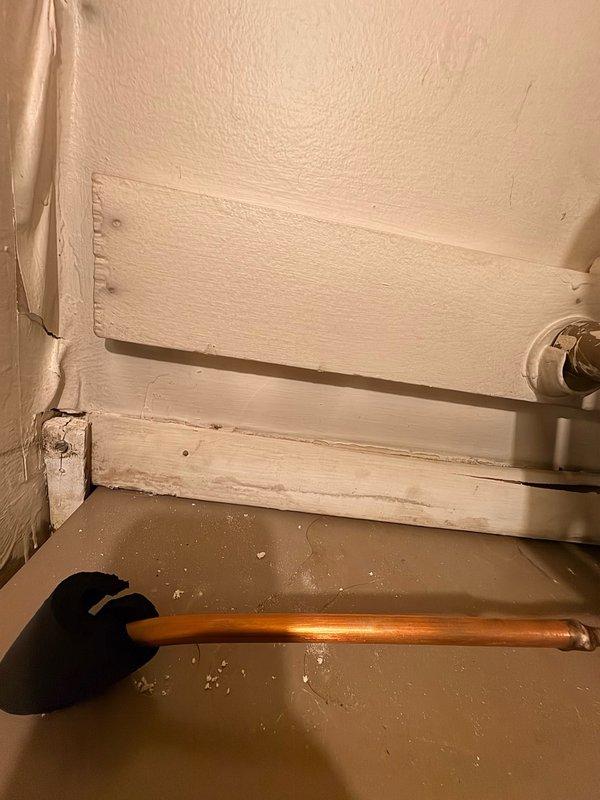 # HVAC Service Completed - No Cool Condition

Responded to warranty service call for air conditioning system not cooling residence effectively. Upon arrival, verified thermostat was set to cooling mode and confirmed air handler was running but delivering insufficient cooling. Conducted systematic diagnostic evaluation of the system.

Performed visual inspection of indoor unit and discovered significant water accumulation on floor near air handler, indicating drainage issue. Identified clogged condensate drain line as primary cause of system malfunction. Water backup triggered float switch safety mechanism, shutting down compressor operation to prevent overflow damage while allowing blower to continue running.

Cleared obstruction from condensate drain line using appropriate tools and techniques. Verified proper drainage flow and tested float switch functionality. Inspected drain pan for cracks or damage - found pan intact. Flushed drain line thoroughly to ensure complete blockage remov