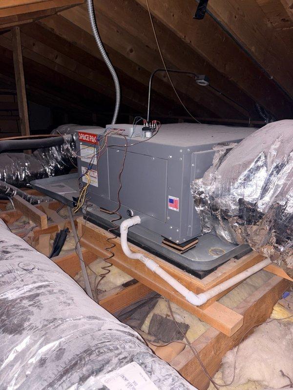 Responded to no-heat service call for residential HVAC system less than five years old. Upon arrival, located Bosch condenser unit and attic-mounted air handler with connected ductwork and PVC condensate line. Performed diagnostic inspection of both indoor and outdoor equipment, verified electrical connections, and assessed system operation to identify cause of heating malfunction.