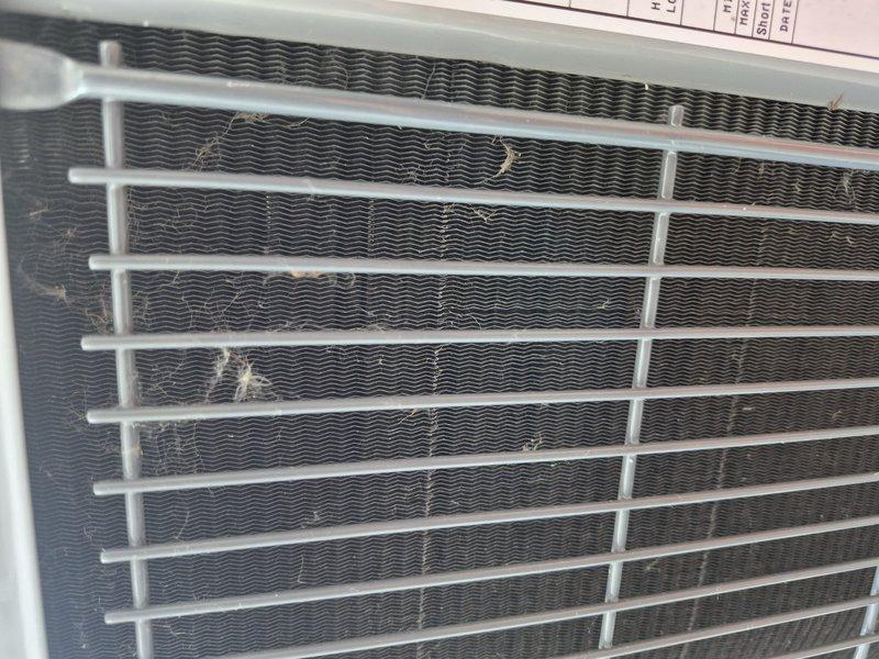 Completed spring clean and check maintenance on three-system HVAC comfort plan. Performed comprehensive inspection of furnace unit in basement mechanical room, verifying operational status of all components, electrical connections, and safety controls. Cleaned condenser coils which showed moderate dust, debris, and cobweb accumulation, restoring optimal heat transfer efficiency. Verified proper drainage system function, inspected all ventilation connections, and confirmed equipment is operating within manufacturer specifications for the upcoming cooling season.
