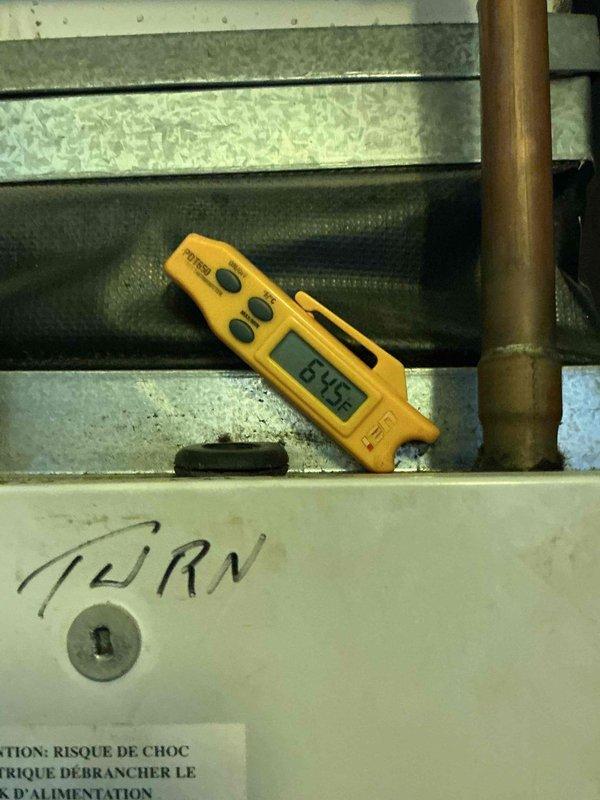 Responded to service call for air handler water leak. Upon inspection, found active condensate drainage issue with customer using temporary bucket collection method. Evaluated indoor air handler unit and exterior condensate drainage system, including PVC drain lines and connections. Documented system temperatures and inspected drain pan, condensate lines, and outdoor drainage components for blockages or failures. Photographed equipment conditions and discussed repair options with customer, including preventive maintenance recommendations through available comfort plan programs.