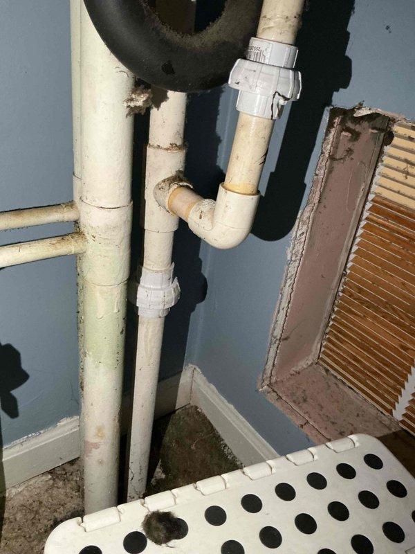 Responded to service call for air handler water leak. Upon inspection, found active condensate drainage issue with customer using temporary bucket collection method. Evaluated indoor air handler unit and exterior condensate drainage system, including PVC drain lines and connections. Documented system temperatures and inspected drain pan, condensate lines, and outdoor drainage components for blockages or failures. Photographed equipment conditions and discussed repair options with customer, including preventive maintenance recommendations through available comfort plan programs.