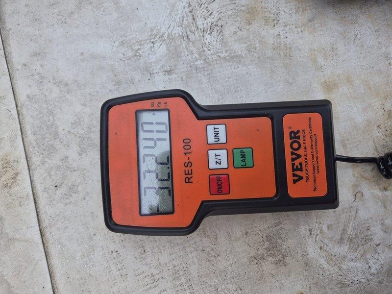 Responded to warranty call for recently installed Carrier AC unit failing to cool properly, with indoor temperature reading 81°F despite thermostat set to 70°F. Performed comprehensive diagnostic testing on the condensing unit using professional HVAC gauges and digital measurement equipment. Checked refrigerant pressures, electrical connections, and system performance parameters. Utilized vacuum recovery equipment and tested system with calibrated Vevor RES-100 measurement device to identify cooling deficiency. Traced issue to installation-related component requiring adjustment under warranty coverage. Restored proper system operation and verified unit achieving target temperature setpoint.
