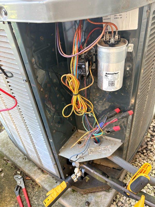 Completed annual air conditioning clean and check maintenance per service contract plan. Inspected outdoor condensing unit with all electrical components including contactor, capacitor, and wiring connections found in proper working condition. Verified indoor return air grille and filter access point for proper airflow.
