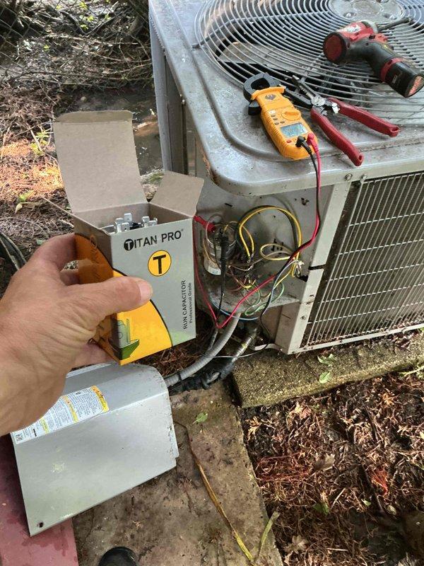 Performed AC clean and check on outdoor condensing unit. Completed diagnostic testing of electrical components and connections using multimeter to verify proper voltage and amperage. Removed access panel to inspect internal wiring and connections. Installed customer-provided humidifier pad as requested. Utilized digital diagnostic instruments to measure system performance parameters including temperature differentials. Verified proper operation of condenser fan motor and compressor. Inspected unit for physical condition and cleared surrounding debris. All components tested within normal operating specifications and system returned to service.