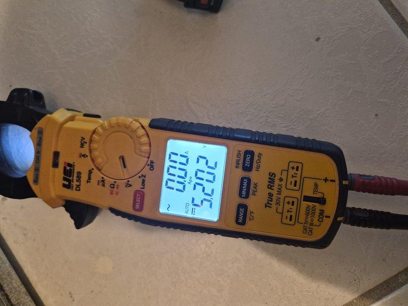 Responded to no cooling complaint at residential property. Upon arrival, performed diagnostic evaluation of air conditioning system. Inspected control board assembly and electrical connections, checking for proper voltage and amperage readings using clamp meter. Measured system performance and verified all wiring connections to circuit board were secure. Documented equipment information and current operating conditions for service records.