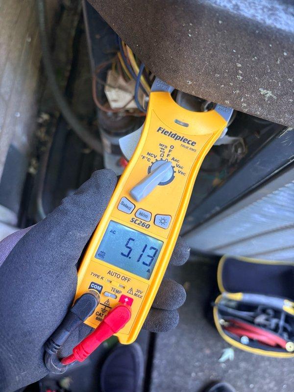 Completed spring preventive maintenance clean and check on single AC system per comfort plan agreement. Performed comprehensive inspection of outdoor condenser unit, cleaned accumulated debris from top grille and surrounding surfaces, and verified electrical connections with multimeter showing 513V reading. Replaced 16x25x4 air filter and confirmed system operating within normal parameters.