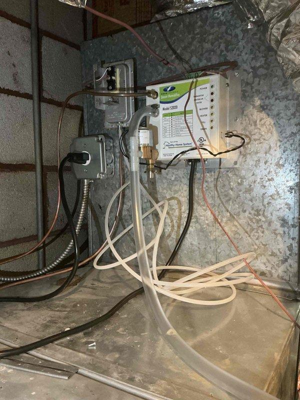 Returned to property for follow-up inspection of dual HVAC systems as requested. Performed comprehensive evaluation of both the Carrier 2-stage 13 SEER unit (Model 551PA060E11744) and associated mechanical systems. Documented equipment conditions, control panel operations, refrigerant line connections, condensate drainage routing, and electrical wiring configurations through photographic records for service documentation and future reference.