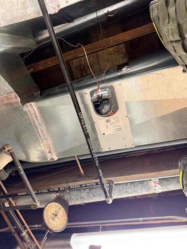 Replaced defective Honeywell zone damper control module (model ZDBX1Z1Z) in the HVAC zoning system. Removed the failed damper actuator from the sheet metal ductwork, installed new replacement unit, reconnected all control wiring and power supply, and verified proper operation of the zone control system with all indicator lights functioning correctly.