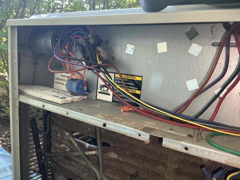 Performed comprehensive clean and check maintenance on residential air conditioning system per comfort plan agreement. Accessed outdoor condensing unit, inspected electrical components including capacitor and wiring connections, and verified proper operation of blower motor assembly. Conducted diagnostic testing with digital multimeter to confirm system electrical performance and refrigerant line integrity. Cleaned unit interior, removed debris accumulation, and ensured all safety labels remain visible and intact for continued safe operation.