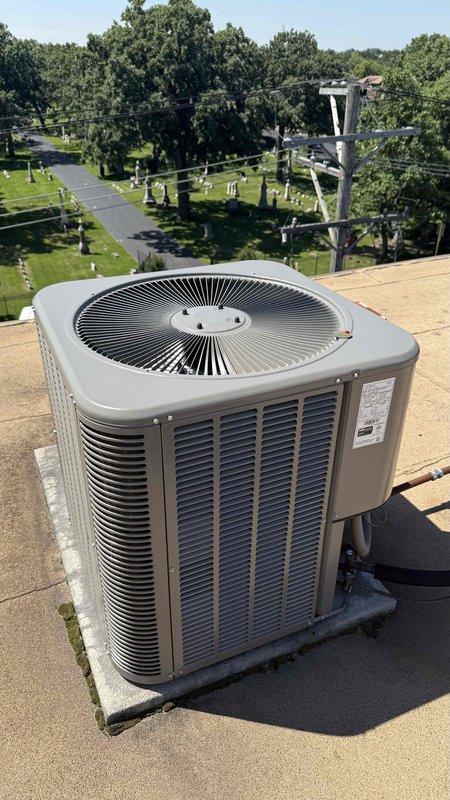 Completed spring preventive maintenance on single-zone air conditioning system per comfort plan agreement. Performed comprehensive clean and check procedures on both indoor evaporator coil and outdoor condensing unit. Inspected evaporator coil assembly in attic space, noting normal condensate drainage with moisture present on drain pan surface. Evaluated outdoor condenser unit positioned on rooftop location, confirming unit operational status with clean exterior surfaces, intact louvers, and properly functioning fan assembly. All system components inspected and found operating within normal parameters.