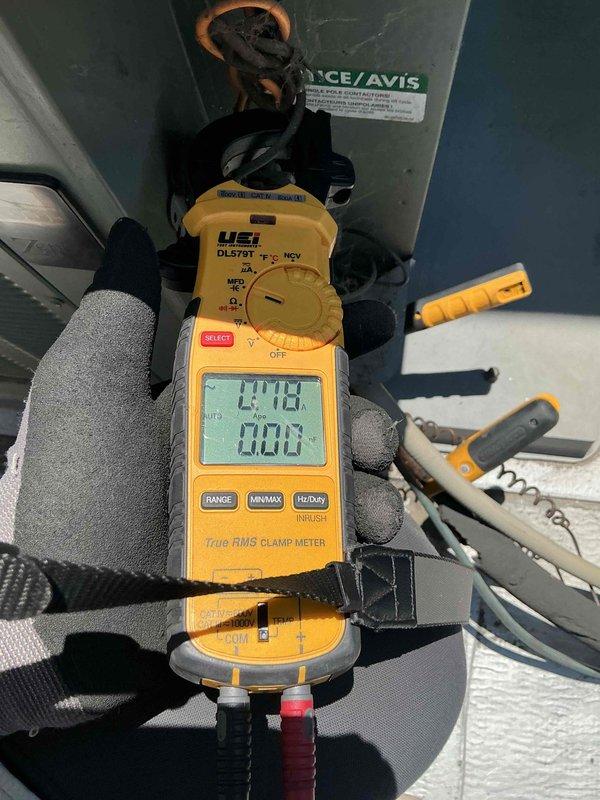 Performed comprehensive clean and check maintenance on one air conditioning system per service contract plan. Conducted electrical diagnostics using digital multimeter and clamp meter, recording voltage readings of 103.9V and amperage draw of 24.18A to verify system performance and proper operation of all components.