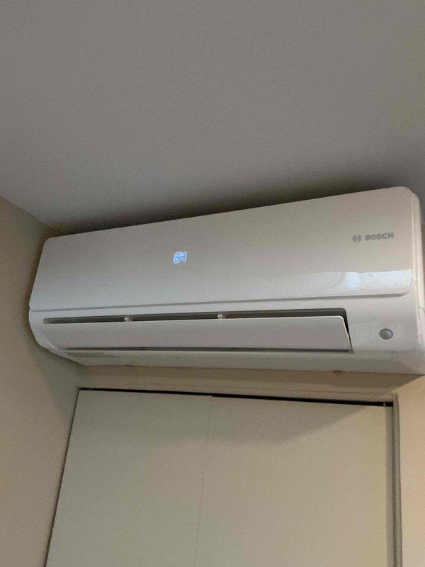 Completed spring maintenance clean and check on Bosch ductless mini-split system and outdoor condensing unit per Comfort Plan agreement. Performed comprehensive inspection of wall-mounted air handler and exterior condenser unit, documented equipment information, and verified proper operation of both systems.