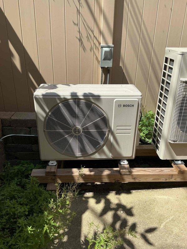 Completed spring maintenance clean and check on Bosch ductless mini-split system and outdoor condensing unit per Comfort Plan agreement. Performed comprehensive inspection of wall-mounted air handler and exterior condenser unit, documented equipment information, and verified proper operation of both systems.