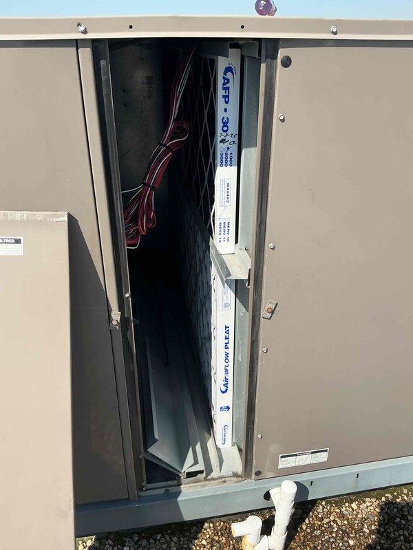Completed scheduled filter change on commercial HVAC system, replacing filters on RTU EP2 (5 pieces, 18x24x2) and air handler (12x20x1). Carbon filters have been ordered and are awaiting delivery; customer contact will be notified upon arrival for installation. All accessible units serviced and documented with photos.