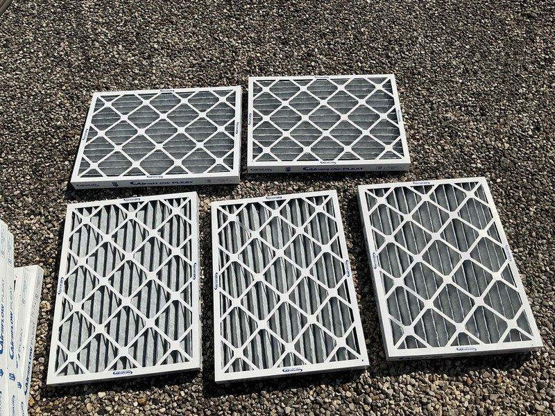 Completed scheduled filter change on commercial HVAC system, replacing filters on RTU EP2 (5 pieces, 18x24x2) and air handler (12x20x1). Carbon filters have been ordered and are awaiting delivery; customer contact will be notified upon arrival for installation. All accessible units serviced and documented with photos.