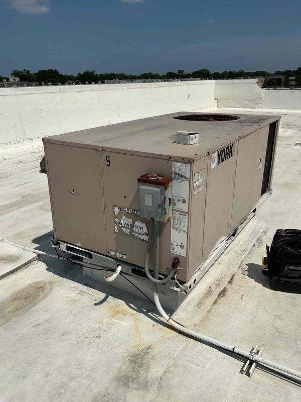 Responded to commercial rooftop HVAC unit requiring control board replacement on York equipment. Successfully removed failed circuit board and installed new replacement board, reconnecting all electrical terminals and verifying proper wire routing. Completed invoice collection for repair services rendered.