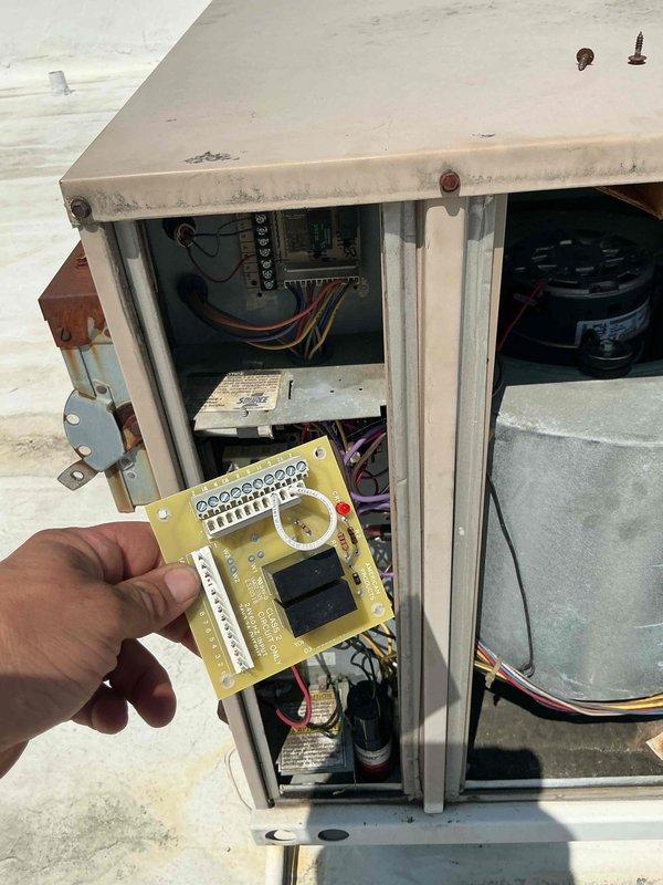Responded to commercial rooftop HVAC unit requiring control board replacement on York equipment. Successfully removed failed circuit board and installed new replacement board, reconnecting all electrical terminals and verifying proper wire routing. Completed invoice collection for repair services rendered.
