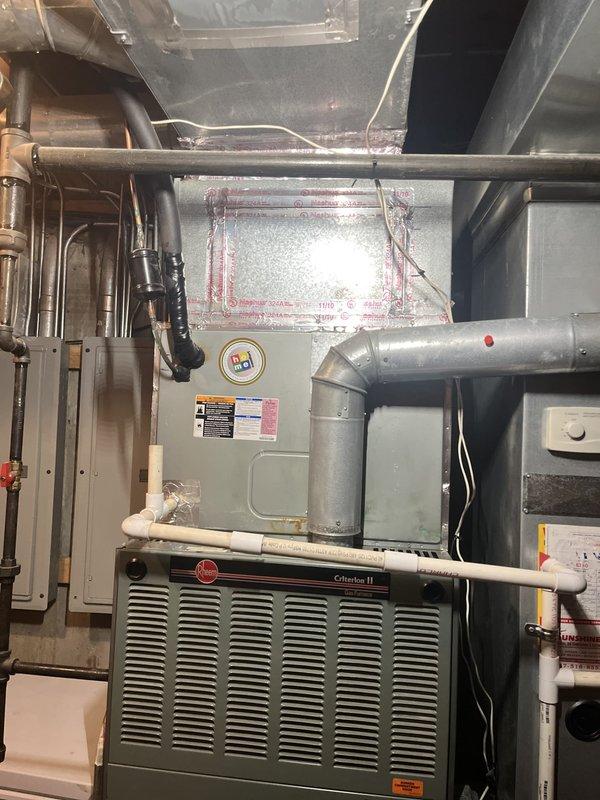 Completed full HVAC system replacement on first floor, installing new Rheem Criterion II furnace and air conditioning unit. System included comprehensive ductwork connections, refrigerant charging with 410A, copper line set installation, PVC condensate drainage piping, gas supply connections, and electrical wiring. All equipment was properly mounted, secured, and tested for optimal performance to address the underperforming cooling system.
