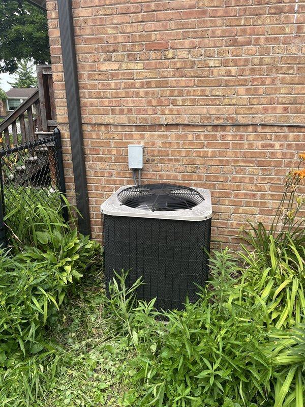 Responded to service call for residential cooling system failure with condenser humming but not engaging. Diagnosed failed compressor motor and inadequate cooling capacity on aging outdoor unit. Provided comprehensive estimate for complete HVAC system replacement including new condenser unit, air handler, and necessary electrical connections.