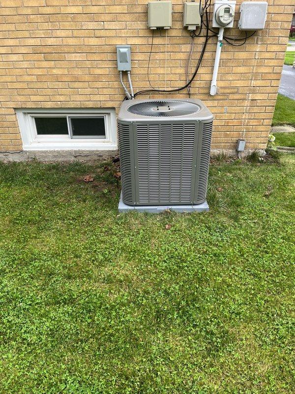 Completed full air conditioning system replacement including reclamation of existing refrigerant from old condenser, coil, and line-set. Removed and disposed of existing equipment, then installed new Lennox 2.5 ton 13 SEER2 single-stage condensing unit (Model ML13KC1-030-230) on leveled pad with pea gravel and new evaporator coil. Connected to existing copper refrigerant lines, evacuated system to remove moisture and air, and charged with R454B refrigerant. Additionally installed EPA-compliant refrigerant detection system on existing furnace per code requirements. Performed complete system start-up, operational testing, and safety inspection with temperature readings confirming proper system performance at 18.8°F supply air temperature. All equipment tested and operating within manufacturer specifications with 10-year parts warranty and extended labor agreement provided.