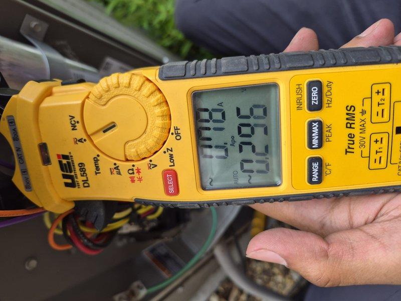 Completed spring preventive maintenance on residential air conditioning system per comfort plan agreement. Performed comprehensive clean and check procedure on outdoor condenser unit and air handler, including electrical testing with digital clamp meter showing operating amperage of 29.9A and voltage readings of 132.3V. Inspected all electrical connections, refrigerant lines, and system components for proper operation. Unit tested and operating within manufacturer specifications.