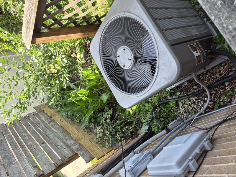 Completed spring preventive maintenance on residential air conditioning system per comfort plan agreement. Performed comprehensive clean and check procedure on outdoor condenser unit and air handler, including electrical testing with digital clamp meter showing operating amperage of 29.9A and voltage readings of 132.3V. Inspected all electrical connections, refrigerant lines, and system components for proper operation. Unit tested and operating within manufacturer specifications.