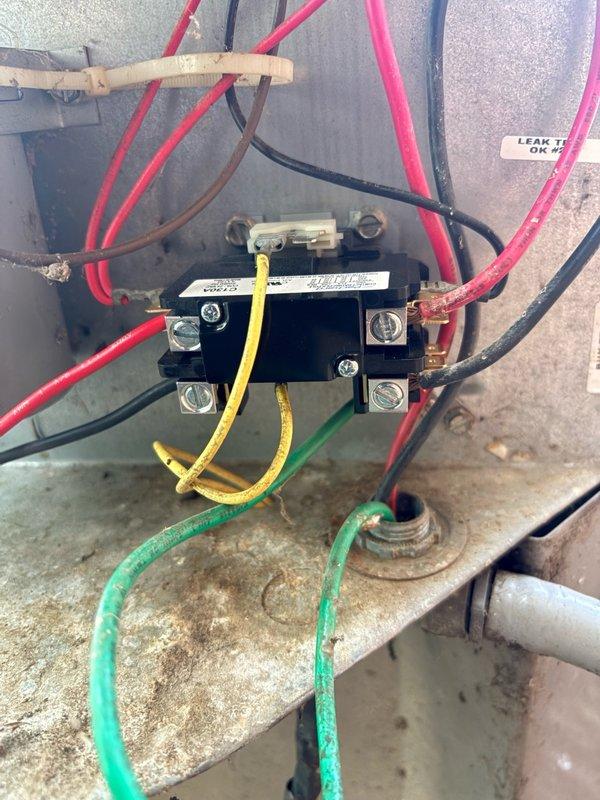 Responded to no-cool complaint on aging HVAC unit from the 1980s-90s era. Diagnosed failed contactor preventing compressor operation. Replaced defective contactor with new component, restored power to compressor circuit, and verified system returned to normal cooling operation.