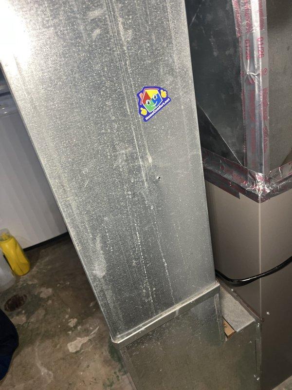Completed quality follow-up inspection on residential HVAC system and water heater installation. Documented system configuration including furnace/air handler unit with supply ductwork, water heater with proper piping connections, and all associated refrigerant lines and utility connections. Verified all components are properly installed with adequate insulation on ductwork and refrigerant lines. System operational and performing as expected.