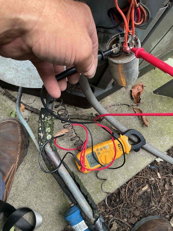 Responded to service call for mini-split system with no cooling capability while heating mode functioned properly. Performed diagnostic assessment of outdoor condensing unit, measuring refrigerant line temperatures and electrical component performance using digital multimeter and temperature probe. Tested capacitor voltage and continuity, inspected refrigerant lines for proper operation, and evaluated system pressures. Identified cooling mode malfunction through systematic troubleshooting of electrical components and refrigerant circuit. Documented equipment information and presented repair options with available pricing to address the cooling deficiency.