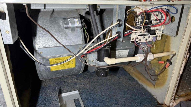 Performed commercial HVAC maintenance visit to replace failed circuit board on heating unit. Accessed equipment using provided lockbox, performed electrical diagnostics with testing meter confirming system malfunction, removed defective control board, and installed replacement circuit board. Verified proper electrical connections, tested blower motor operation, and confirmed system returned to normal function with all safety controls operational.