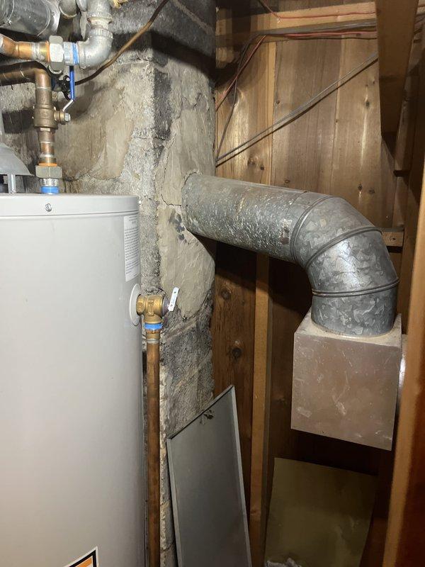 Conducted comprehensive assessment of existing HVAC system for full replacement estimate. Documented severely outdated equipment including furnace dating from the 1960s and air conditioning unit over 20 years old, both located in utility closet with water heater. Evaluated existing ductwork configuration, mechanical space constraints, and current system layout to develop replacement specifications and installation requirements.