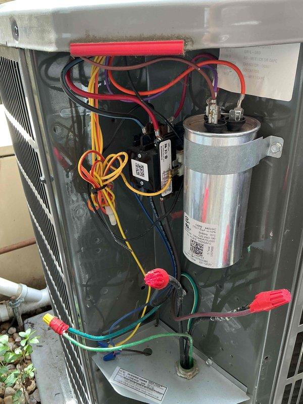 Completed spring clean and check maintenance on four air conditioning systems per service contract plan. Performed comprehensive inspection of all units including electrical component testing with digital multimeter, verified capacitor operation and specifications, inspected all wire connections and terminals for secure contact, and confirmed proper system function. All units operating within normal parameters with no deficiencies noted.