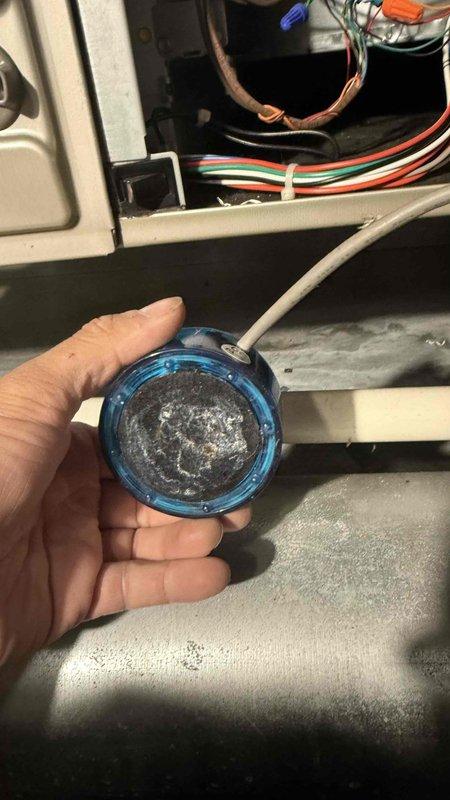 Responded to no cooling call and diagnosed failed wet switch with significant corrosion and debris buildup visible inside the sensor housing. Replaced defective wet switch with new component and restored system to proper operation. Verified all electrical connections at control board, tested system functionality, and confirmed unit cooling effectively upon completion.