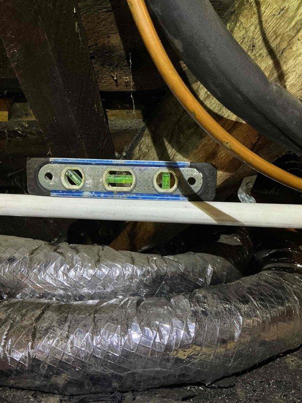 Performed quality audit on recently installed HVAC system to address concerns regarding airflow velocity and noise levels from four new supply registers compared to existing ductwork. Inspected attic installation including flex duct runs, plenum connections, and distribution system layout. Evaluated system performance and identified that new supply runs are operating at full design capacity to maintain proper airflow across evaporator coil, which accounts for increased velocity compared to older, potentially restricted existing runs. Assessed need for potential damper installation or airflow balancing adjustments to reduce noise levels while maintaining adequate system performance and cooling capacity.