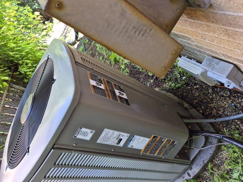Completed comprehensive air conditioning tune-up and maintenance on single system. Condenser coil showed significant accumulation of dirt, debris, and environmental contaminants requiring thorough cleaning to restore proper airflow and heat transfer efficiency. Inspected all electrical components, verified proper operation of compressor and fan motor, and documented unit condition with photographic records for customer reference.