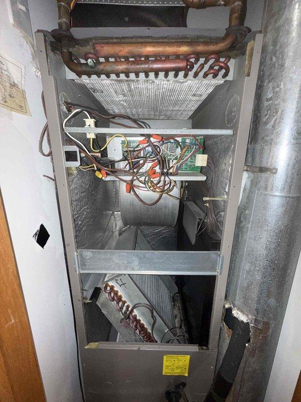 Completed Comfort Plan clean and check maintenance on single HVAC system including air conditioning condenser unit and air handler. Performed comprehensive inspection of both indoor and outdoor components, measured electrical amperage readings at condenser unit showing 126.2 amps, inspected evaporator coils and heat exchanger for proper operation, verified electrical connections and wiring integrity, and documented system condition with photographs. Collected payment and processed comfort plan renewal as requested.