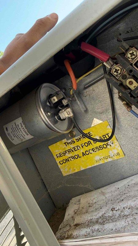 Responded to no cooling complaint on 10+ year old air conditioning system. Performed diagnostic evaluation including thermostat verification, filter inspection, and electrical breaker check. Measured supply air temperature at return grille registering 65°F, confirming inadequate cooling performance. Inspected outdoor condensing unit and accessed electrical compartment to examine capacitor and control components, finding visible signs of age, dust accumulation, and potential component degradation. Coordinated with office regarding property management approval process for condo association billing procedures before proceeding with repairs.