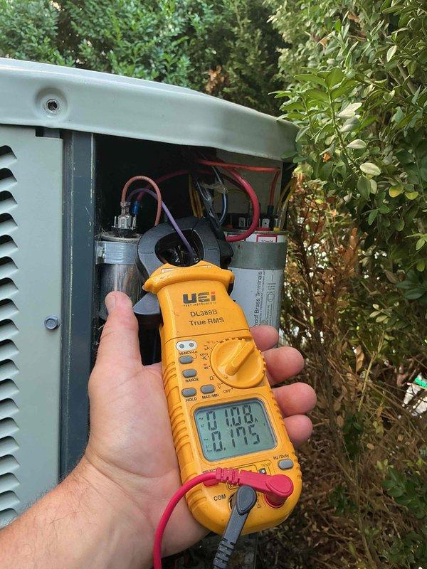 Performed comprehensive clean and check maintenance on two air conditioning systems per comfort plan agreement. Addressed ongoing issue with one unit that had been experiencing intermittent operational problems, conducting diagnostic testing with digital multimeter to measure capacitor performance and electrical values. Inspected and tested run/start capacitors, verified proper electrical connections, and documented system readings to ensure both units are operating within manufacturer specifications.