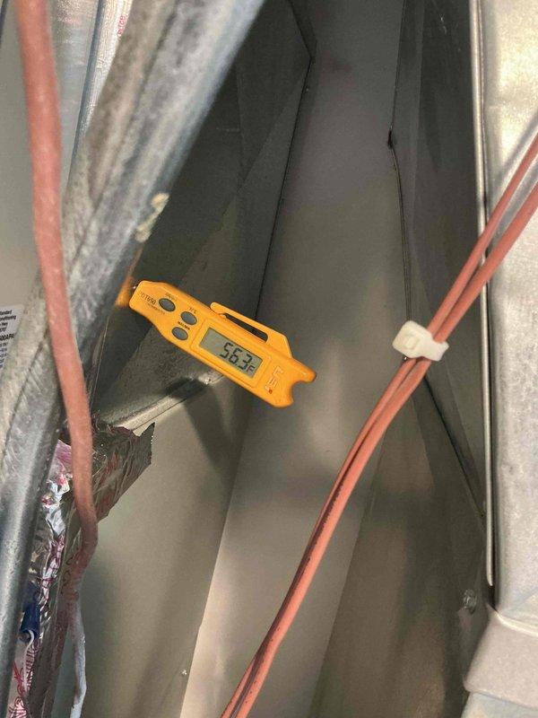 Responded to warranty callback for second floor cooling issue. Performed diagnostic temperature measurements at air handler unit, recording supply air temperature of 46.3°F and return air temperature of 73.9°F, confirming system is producing adequate temperature differential and operating within normal parameters.