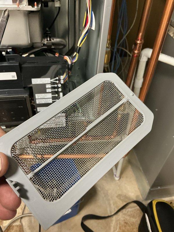 Performed clean and check maintenance service on Rinnai RXP199i tankless water heater system per comfort plan agreement. Inspected unit operation, removed and cleaned mesh intake filter which showed moderate dust and debris accumulation, verified all electrical connections and copper piping integrity, and confirmed unit specifications including 150,000 BTU/h maximum input rating and proper venting clearances.