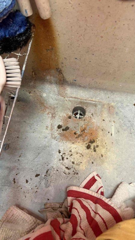 Responded to no cooling complaint where system was short cycling and shutting off multiple times throughout the day. Inspected condensate drain system and found clogged drain line causing float switch to trip and shut down system for safety. Cleared blockage from PVC drain line using appropriate tools and verified proper drainage flow. Tested system operation and confirmed unit running normally with adequate cooling and no further safety shutoffs.