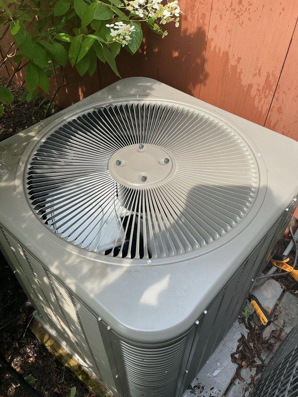 Responded to warranty service call for non-operational air conditioning system. Performed diagnostic inspection of both first and second floor AC units, which were previously installed by our company. Conducted thorough assessment of outdoor condenser unit, verifying proper mechanical operation, refrigerant levels, and electrical connections. Inspected indoor air handler and return air grille for proper airflow and system functionality. Identified and resolved warranty-covered issue, restoring full cooling capacity to both HVAC systems. Documented equipment condition with photographic evidence showing outdoor condenser unit and indoor ventilation components in operational status.
